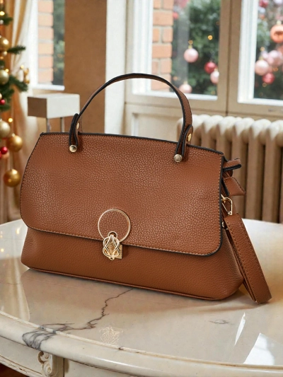 Liten dameveske i miljøvennlig skinn Vinem