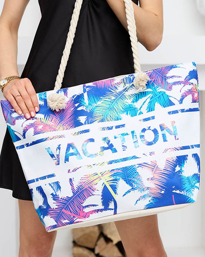 Blue beach bag with floral print - Accessories