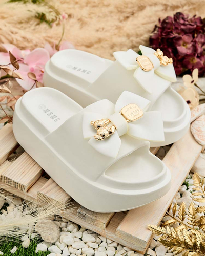 Royalfashion Women's rubber flip-flops with decorative bow Apis