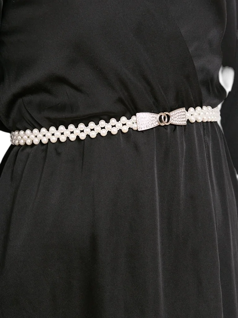 Pas damski Callista perłowy z klamrą kokardą – elegancja w stylu włoskim