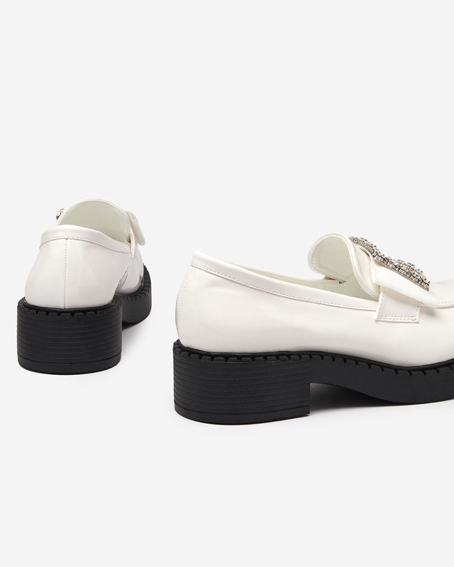 Lacquered shoes with a white buckle. Fogim- Footwear