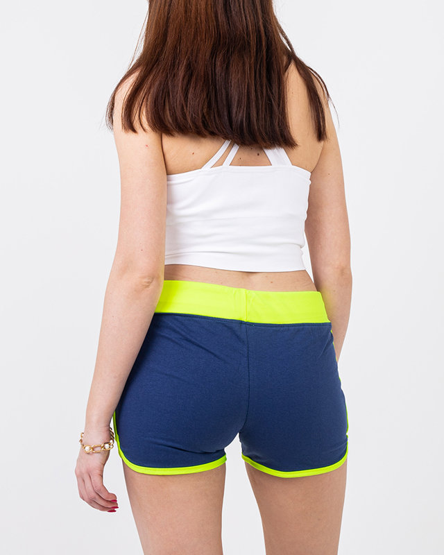 Blue and yellow shorts with a badge - Clothing