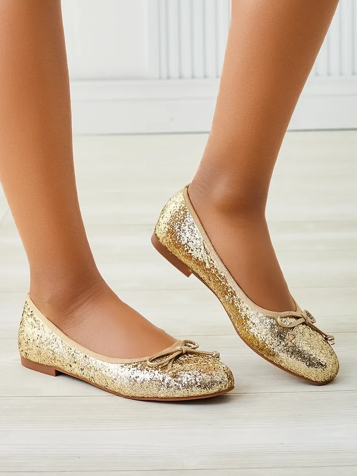 Royalfashion sieviešu baleta kurpes ar mirdzumu un loku Aramie