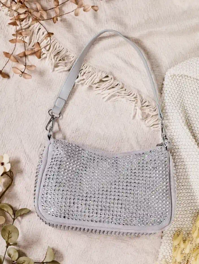 Royalfashion Small women's bag with studs