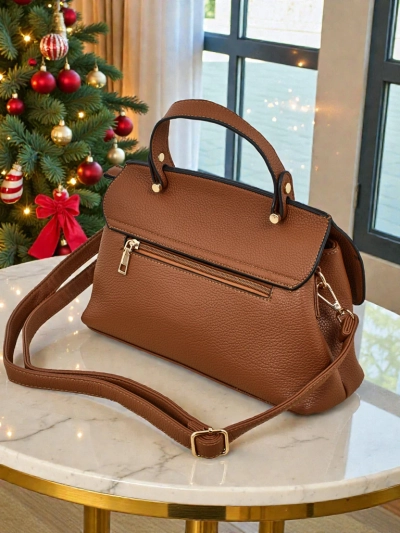 Liten dameveske i miljøvennlig skinn Vinem