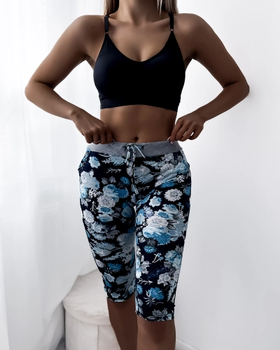 Royalfashion Dark blue women's 3/4 shorts with floral pattern PLUS SIZE