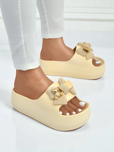 Royalfashion Women's rubber flip-flops with a decorative bow Alday