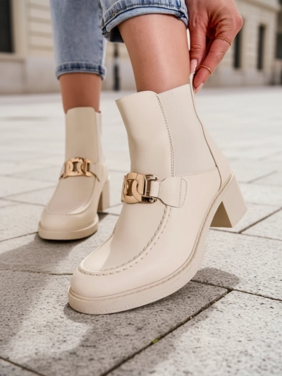 Royalfashion Women's ankle boots with a low heel Ewios