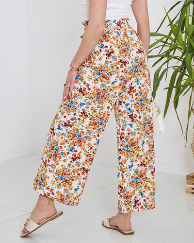 Women's white palazzo pants with orange flowers- Clothing