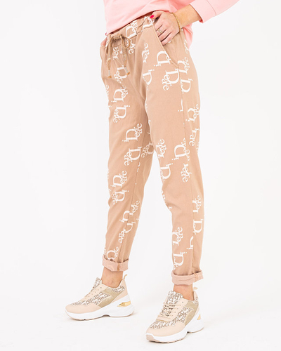 Ladies' beige fabric trousers with inscriptions - Clothing