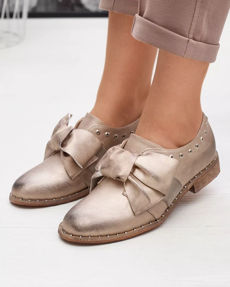 Gold women's low shoes with Entera bow - Footwear