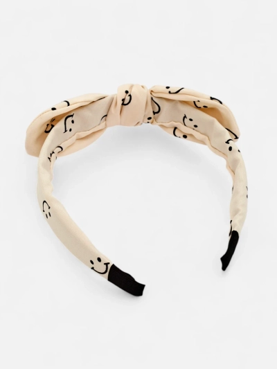 Royalfashion Children's headband with a bow with a smiley face print