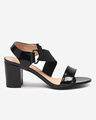 Black lacquered women's sandals on the Wopala post - Footwear