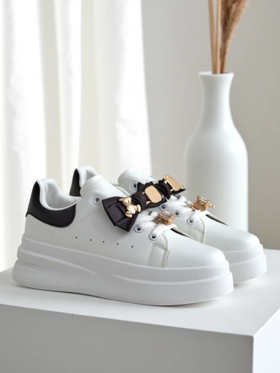 Royalfashion Women's platform sneakers with a bow Genimma