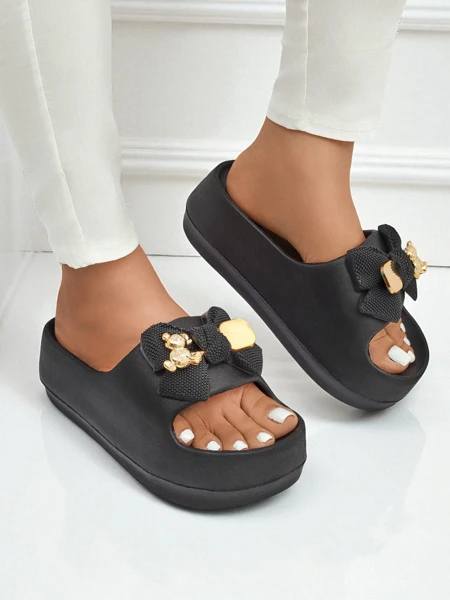 Royalfashion Женские резиновые шлепанцы с декоративным бантом Alday