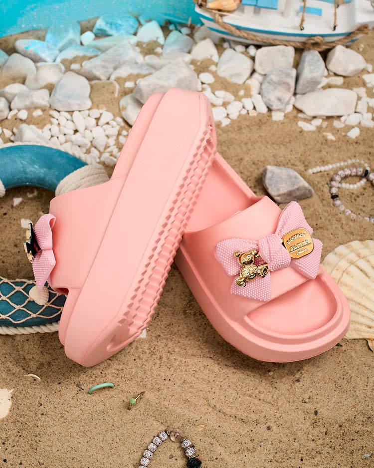 Royalfashion Women's rubber flip-flops with decorative bow Nilm