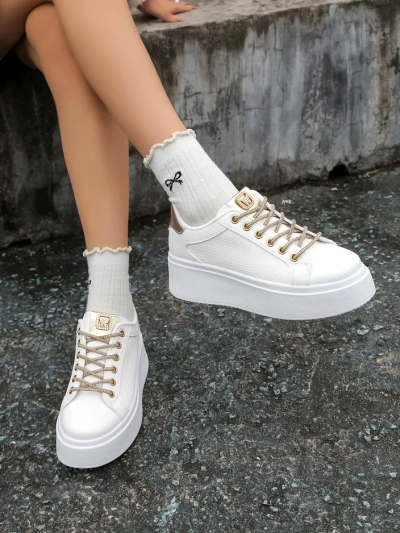Royalfashion Women's sporty sneakers with decorative laces Eone