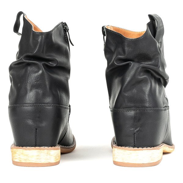 Black cowboy boots on a daress's wedge heel - Footwear 1