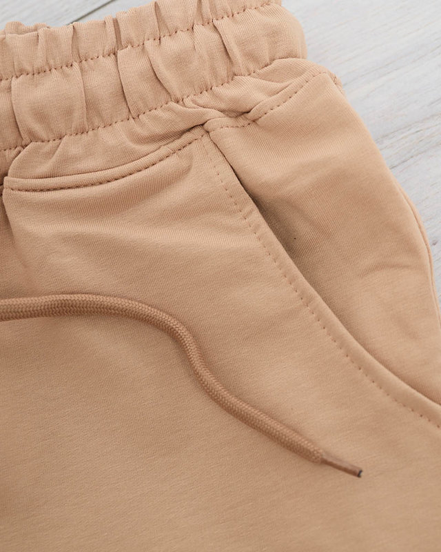 Women's beige sweatpants with cubic zirconia - Clothing
