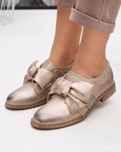 Gold women's low shoes with Entera bow - Footwear