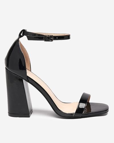 Black women's sandals on the post by Whopso - Footwear