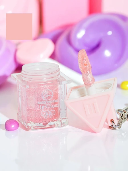 Mirdzoša lūpu spīduma krāsa Gaiši rozā