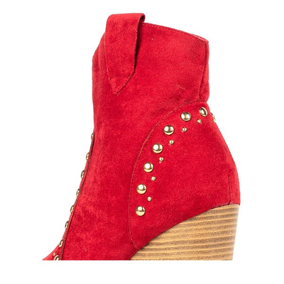 Red cowboy boots on a high Gana post - Footwear