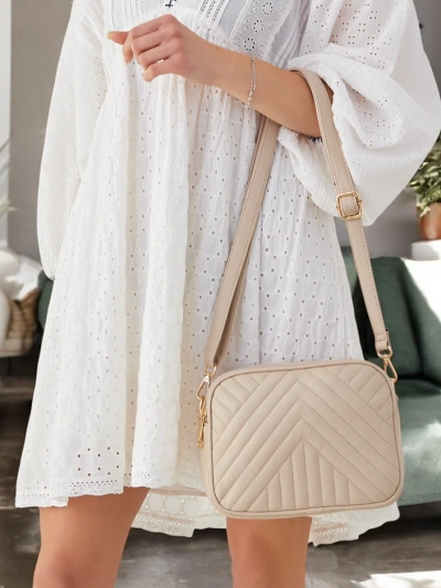 Royalfashion Small oval women’s handbag made of quilted eco-leather