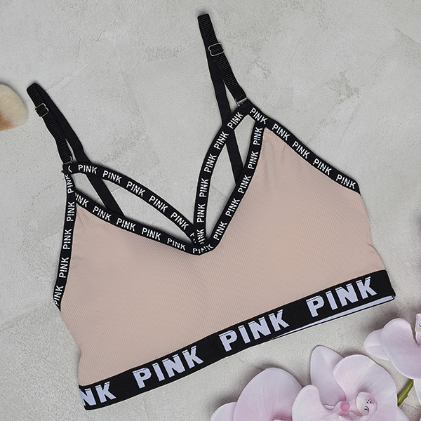 Women's pink sports bra with inscriptions - Underwear