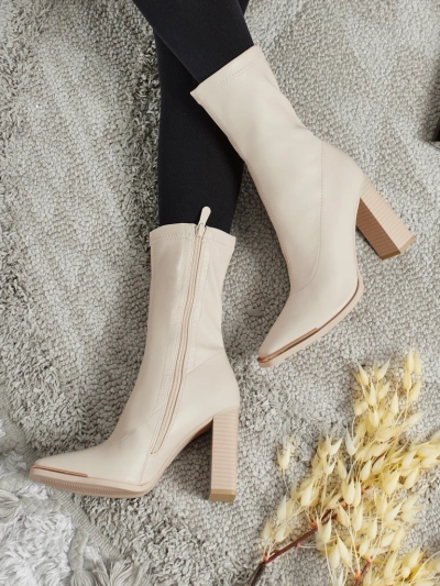 Женские ботильоны Morvella из экокожи на каблуке-столбике