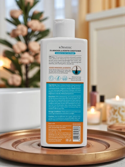 Shampoo me Minoxidil 5% dhe Keratinë