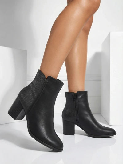 Royalfashion Women's ankle boots on a post Abinom