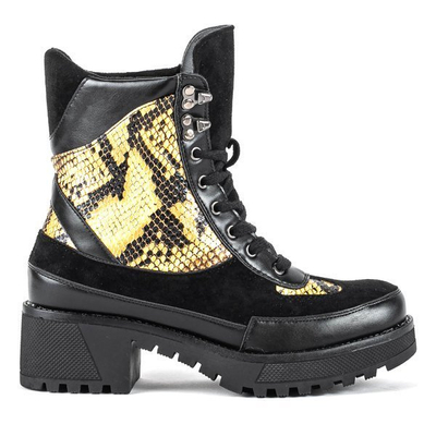 Black snakeskin imitation bags on a pole - Footwear