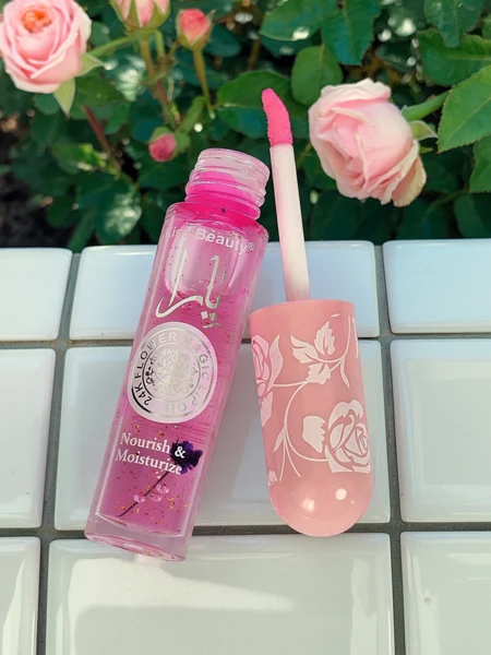 Lūpų blizgesys su blizgučiais, keičiantis spalvą