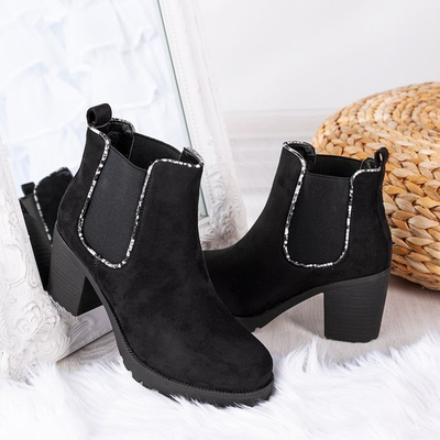 Black boots on a higher post Travolte - Footwear