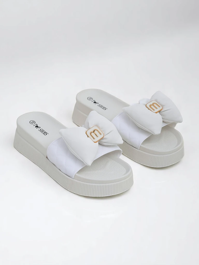 Royalfashion Women's platform flip-flops with a bow Mivo Jump