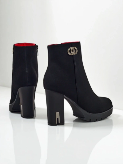 Ladies' bots from matte eco leather on a Olivane post