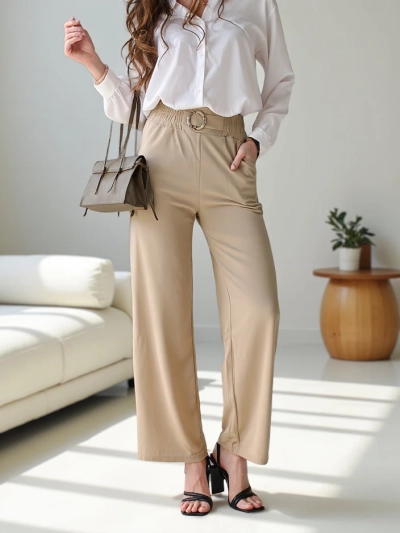Royalfashion Wide women's trousers with a decorative buckle