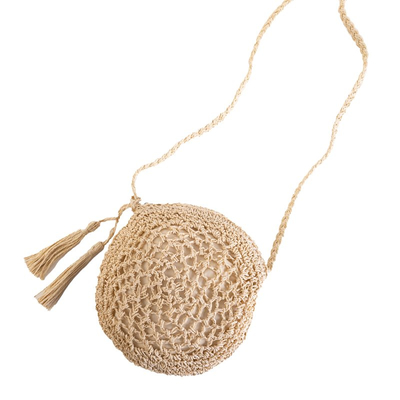 Small round handbag made of beige braided straw - Handbags