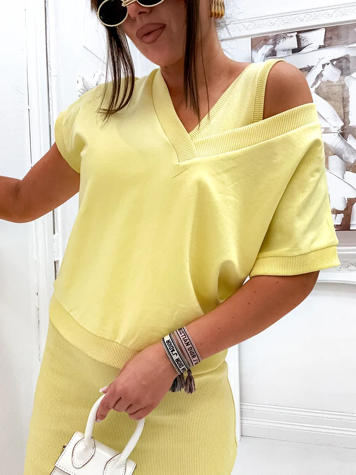 Royalfashion Sieviešu komplekts ar atklātu sporta krekla un ceļgala garuma kleitu