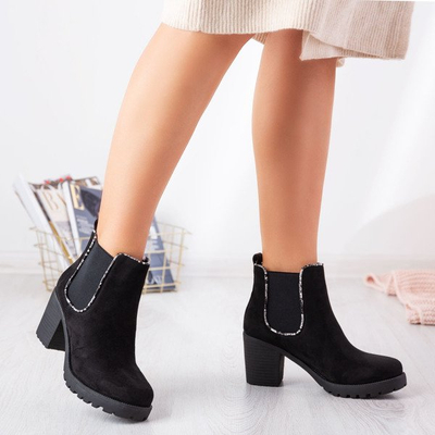 Black boots on a higher post Travolte - Footwear