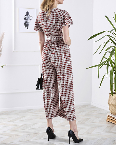 Patterned long women's jumpsuit with binding in red- Clothing