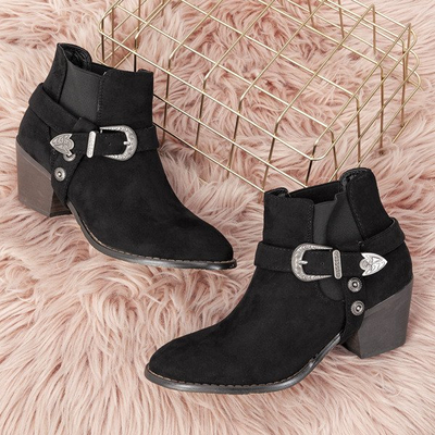 Black boots on a low post asiene cowboy boots - Footwear