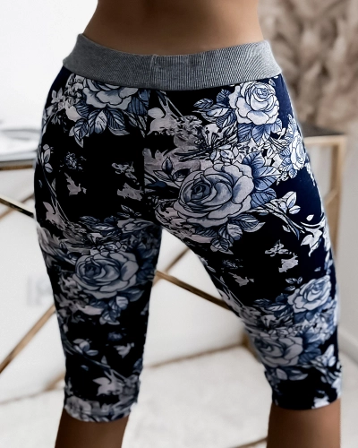 Royalfashion Navy blue women's 3/4 shorts with floral pattern PLUS SIZE