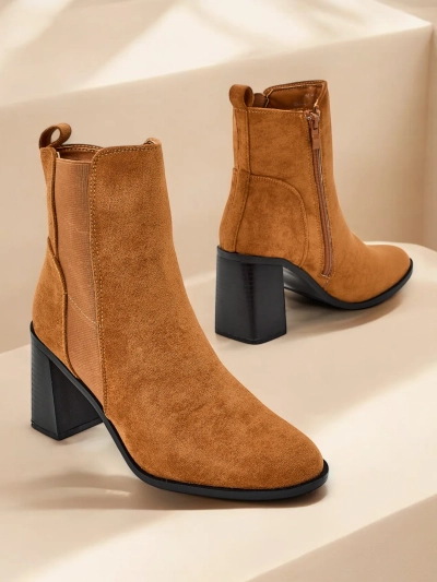 Royalfashion Women's ankle boots on a chunky heel Enotto