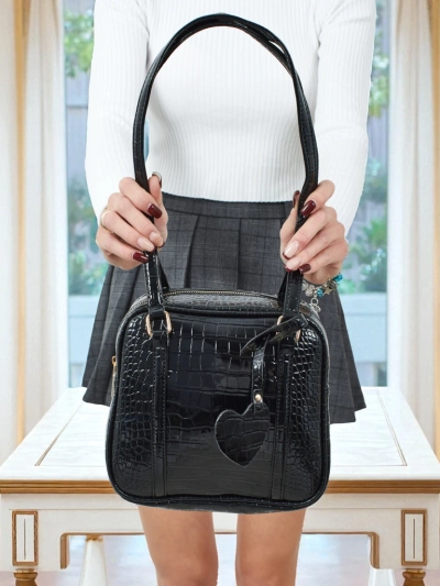 Лакированная маленькая женская сумка из экокожи Velinne