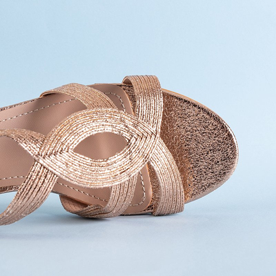 Gold women's sandals on a Madurai post - Footwear