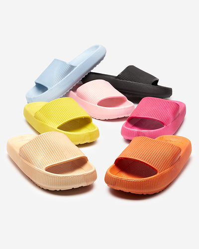 Green rubber slippers with Torika embossing - Footwear