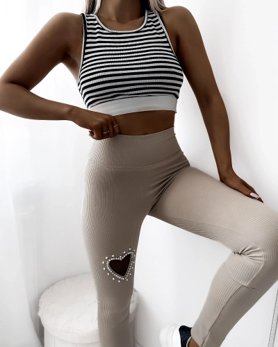 Women's leggings in beige with heart - Clothing