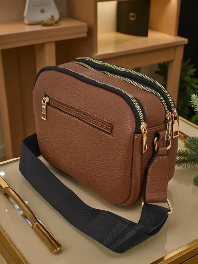 Quiltet liten dameveske i miljølær Corinne